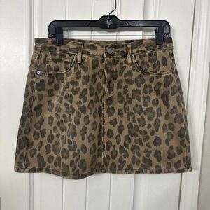 Blank NYC brown and black washed out leopard print denim mini skirt.